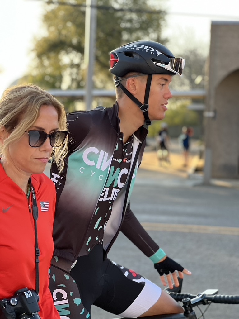 Cecilia walking beside Donoven before a race start
